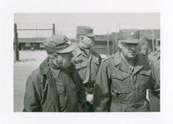 Roy Howard with military personnel in Korea