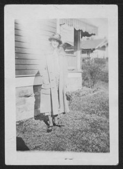 Lida Carmichael outside house on Washington Avenue, Bloomington, Indiana.