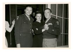 Two men and a woman pose for the camera