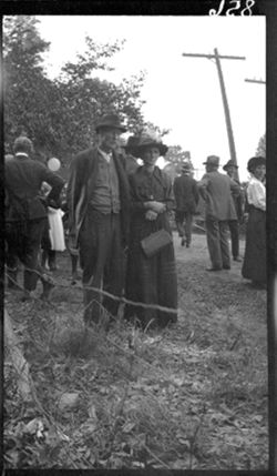 Couple being photographed at Old Settler's meeting