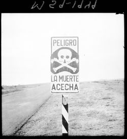 Skull-crossbones highway sign
