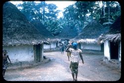 Women walking through village