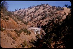Hwy US 40 Alt. Crosses West Branch Feather river on concrete arch bridge near its junction with Feather river.