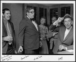 Hoagy Carmichael standing with (left to right) Lou Scott (President of the Indiana University Club of Los Angeles), Frank Jones, and Mrs. and Mr. Bob Stoll (Director of Singing Hoosiers), Hollywood.