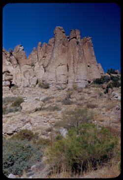 Row of chimney rocks above old US 60-70 east of Superior, Arizona