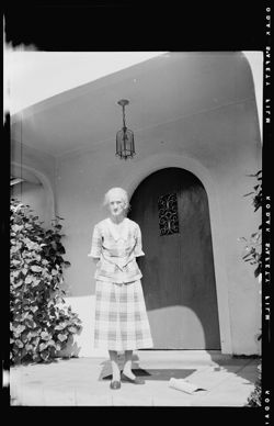 Lida Carmichael on a porch.