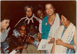 Clarence Muse with six unidentified women at 5th Annual Oscar Micheaux Awards Ceremony