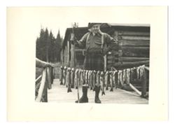 Roy Howard posing with fish
