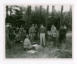 Dwight D. Eisenhower and military men in woods