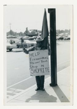 Person with Shop-Rite boycott sign