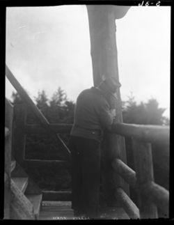 Man whittling on tower, Clingman's Dome