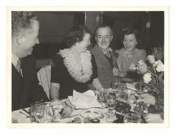 Roy Howard and company dining at an event