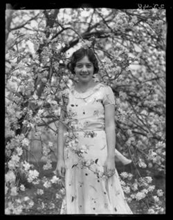 Swansea Campbell, Monroe, La., among apple blossoms