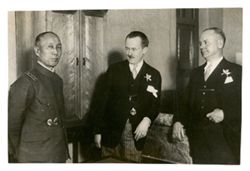 Roy Howard with two other men