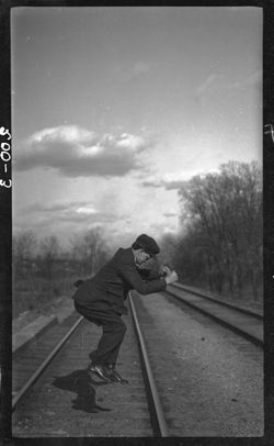 John Carpenter jumping across track, April 7, 1912, Easter