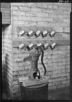 Old pumps and drinking cups, Nashville school