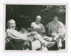 Three men sitting together at Bohemian Grove
