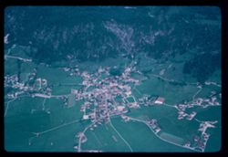 Little village in a mountain valley seen from Salzburg-Innsbruck Austrian Air Lines plane.