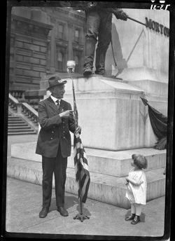 Mr. Crampton and Schortemier girl, with flag