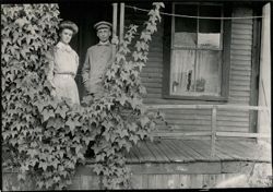Couple standing on porch