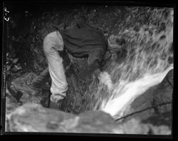 Herb Miller drinking at waterfalls