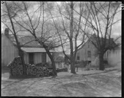 Old Mrs. McDonald home, woodpile at edge, horizontal