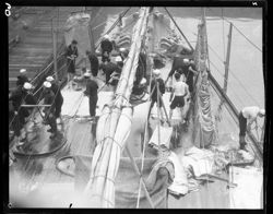 Sailors washing hammocks