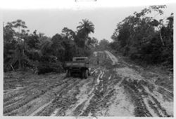 Truck traveling on a muddy road