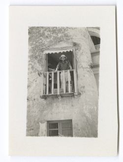 Item 0977. Eisenstein standing on balcony seen in Item 976 above.