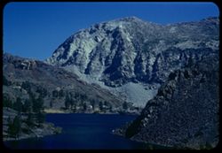 Granite shoulder of Dana Plateau seen from shore of Ellery Lake.  Near top of Tioga Pass east of Yosemite.