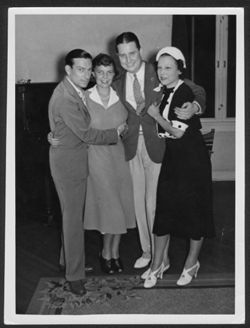 Hoagy Carmichael and Ruth Carmichael posing with Johnny and Ginger Mercer.
