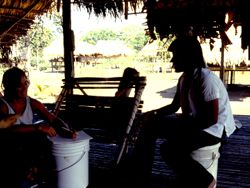 Stephanie Kane translating stories with field assistant