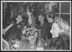 Hoagy Carmichael with Johnny Mercer and Jerry Colonna and two unidentified women at the Racquet Club in Palm Springs.