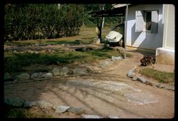 Carport and front yard at Whitten residence