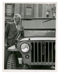 Roy Howard with Cleveland Press vehicle