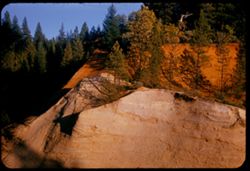 Side of deep gorge along Calif. Hwy 49 near Sierra - Yuba county line.