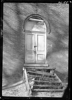 Closeup of doorway of old school out of Mahalasville