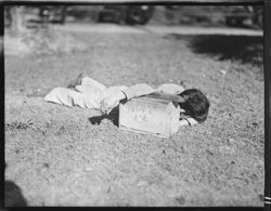 Shoeshine boy, asleep, at Jackson Sq., N.O.