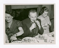 Roy Howard dining with women