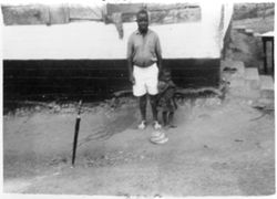 Man and his daughter at Cavalla Plantation