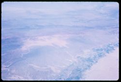 Pan-Am jet 707 over S.W. Amer. desert on flight Los Angelas to Winnipeg to London