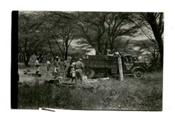 Men set up hunting camp