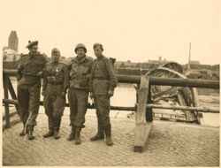 Soldiers in front of a bridge