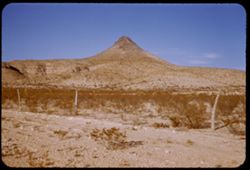 Little cone-shaped peak on Big Bend hwy 25 mi. south of Marathon, Texas.