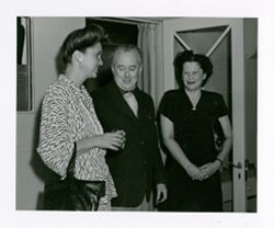 Roy Howard with two women