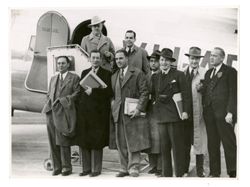 Roy Howard and others boarding plane