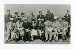 Group of men and woman sitting together