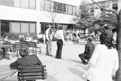 Gathering in courtyard of Northside Hall at IU South Bend, 1975
