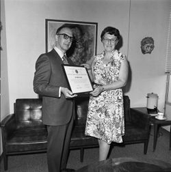 Chancellor Lester Wolfson presents diploma to Althea Snyder at IU South Bend, 1970s