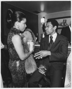 Arthur Mitchell and unidentified woman at reception
